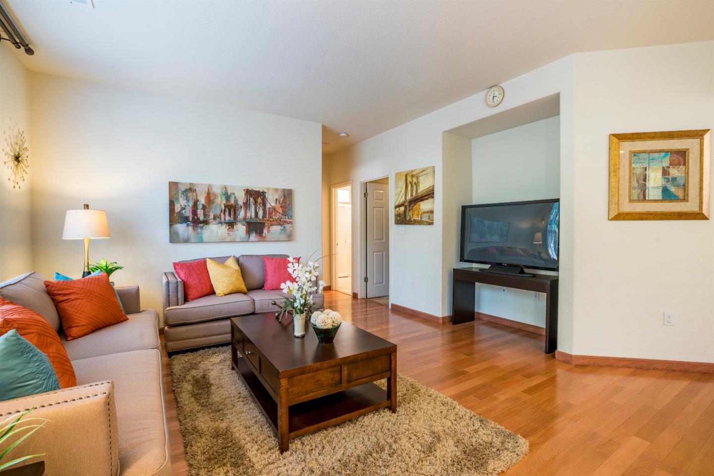 2235 Woodranch Road San Jose, CA 95131 - Photo 18 of 40 a living room with furniture and a flat screen tv