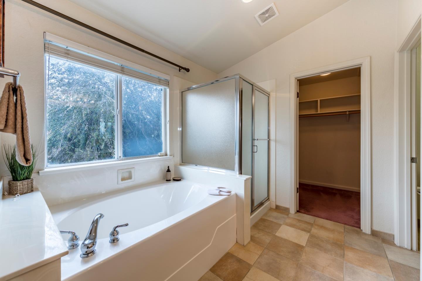 2235 Woodranch Road San Jose, CA 95131 - Photo 25 of 40 a bathroom with a tub and a sink