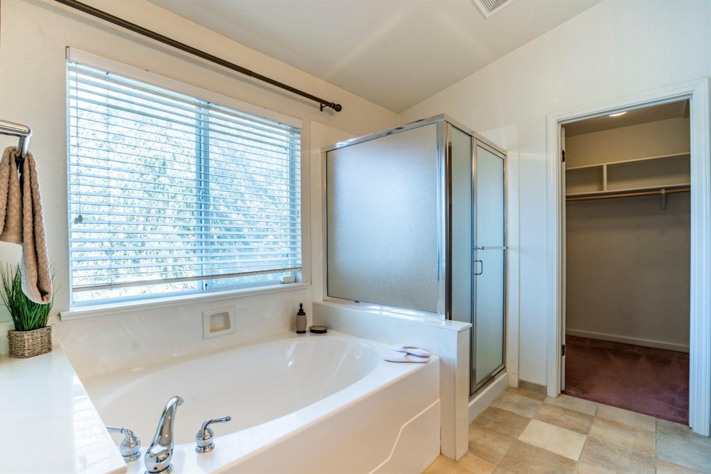 2235 Woodranch Road San Jose, CA 95131 - Photo 27 of 40 a bathroom with a bathtub and a sink