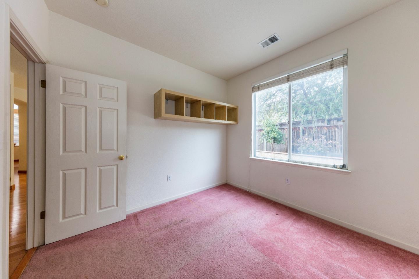 2235 Woodranch Road San Jose, CA 95131 - Photo 29 of 40 a view of an empty room with a window