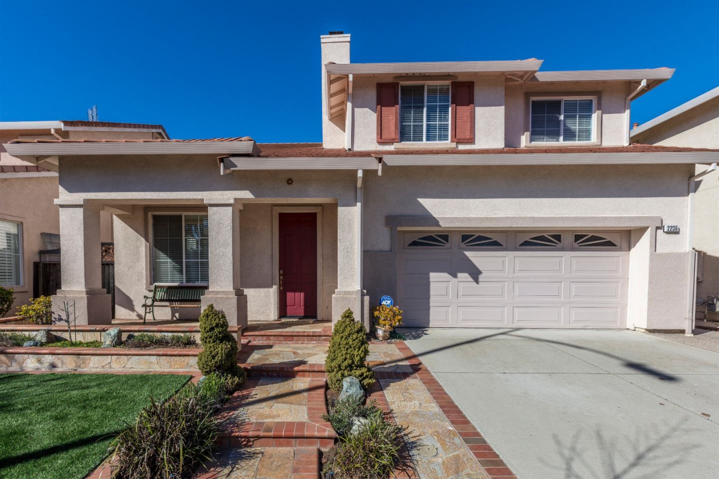 2235 Woodranch Road San Jose, CA 95131 - Photo 3 of 40 a front view of a house with garden