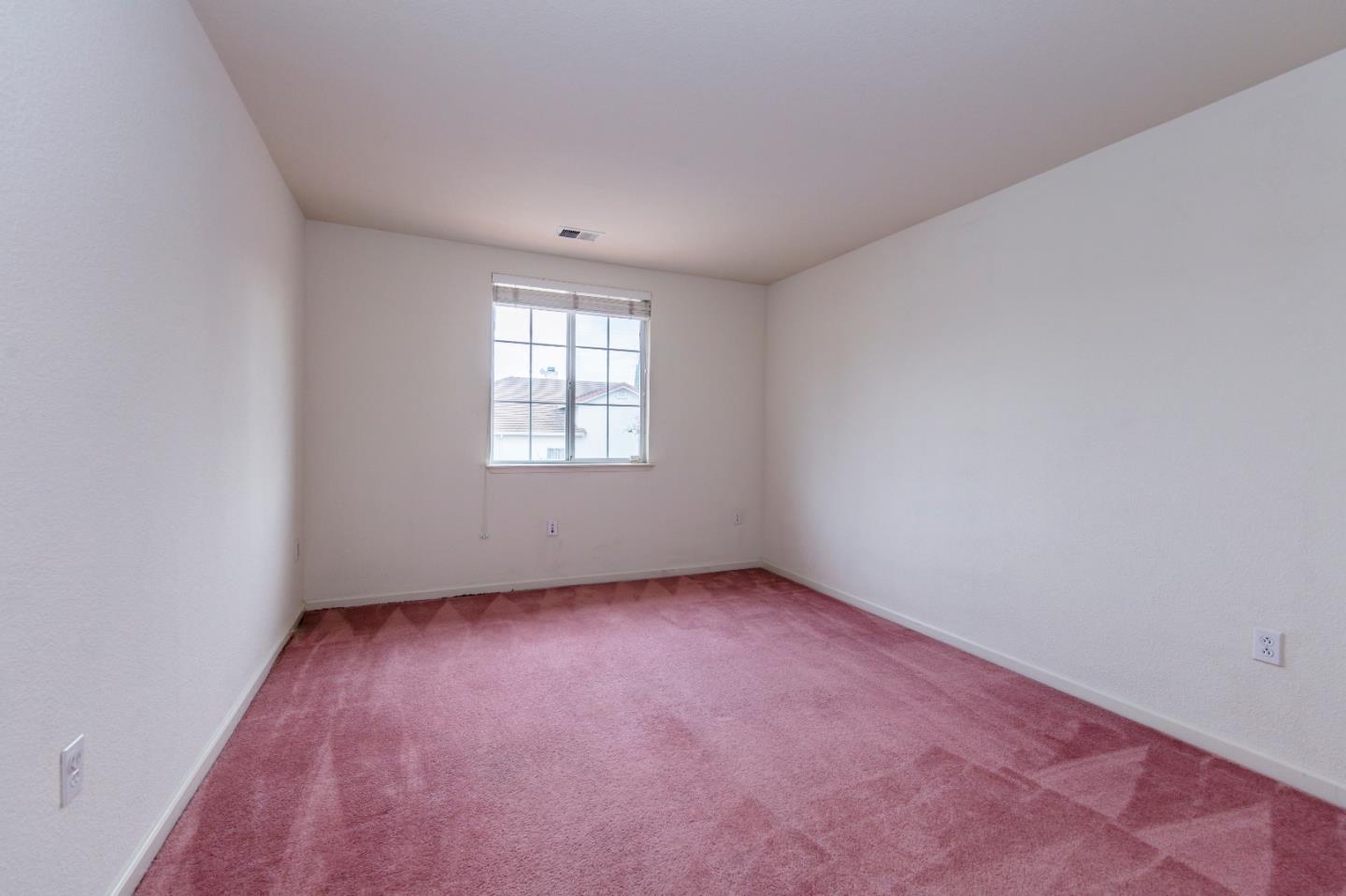 2235 Woodranch Road San Jose, CA 95131 - Photo 31 of 40 an empty room with a window