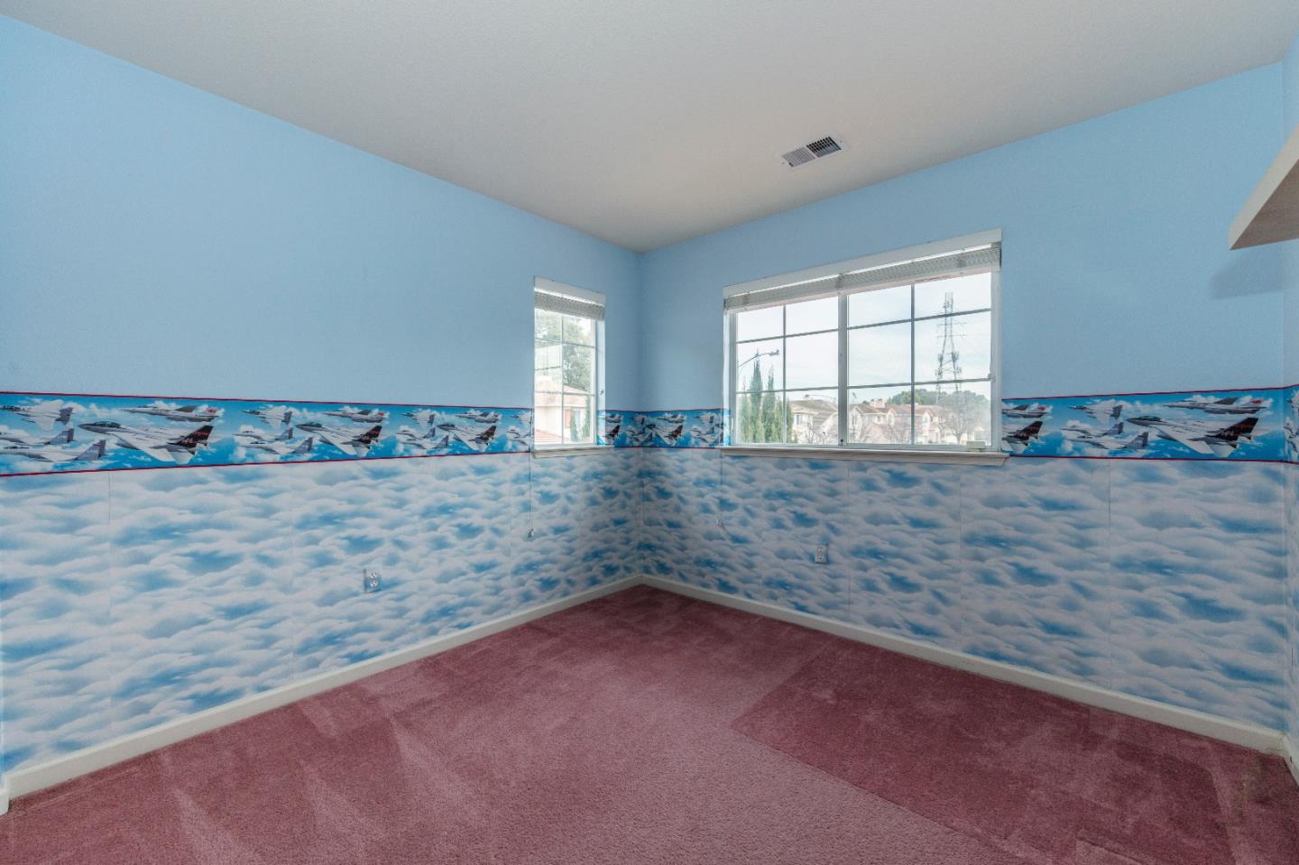 2235 Woodranch Road San Jose, CA 95131 - Photo 34 of 40 a kitchen with granite countertop a sink window and cabinets