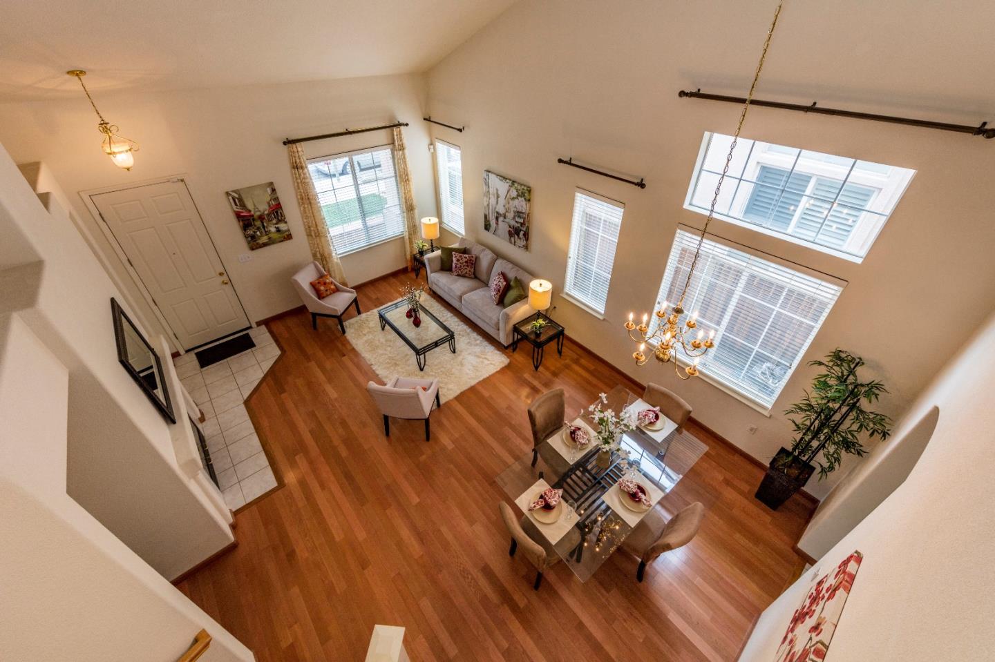 2235 Woodranch Road San Jose, CA 95131 - Photo 4 of 40 a living room with furniture and a large window