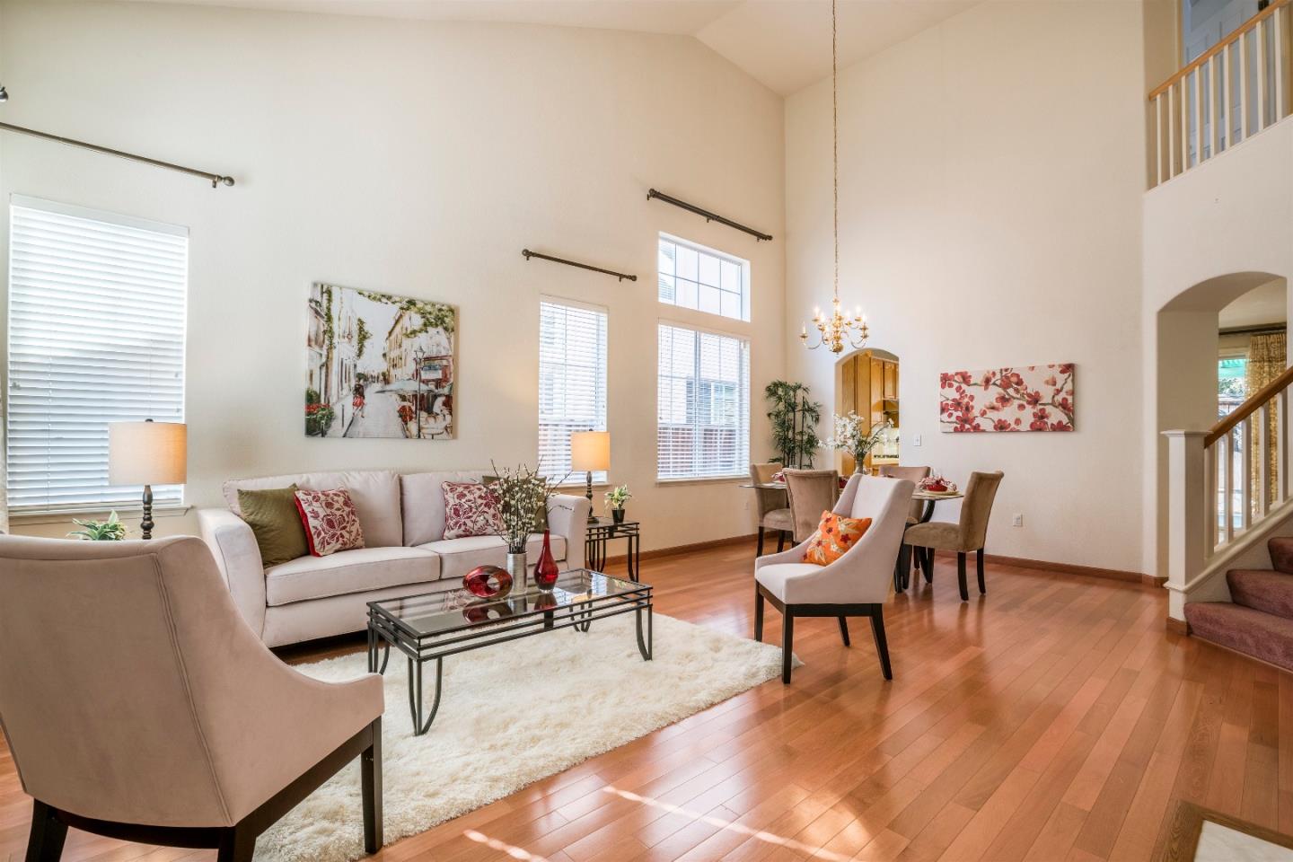 2235 Woodranch Road San Jose, CA 95131 - Photo 7 of 40 a living room with furniture and a large window