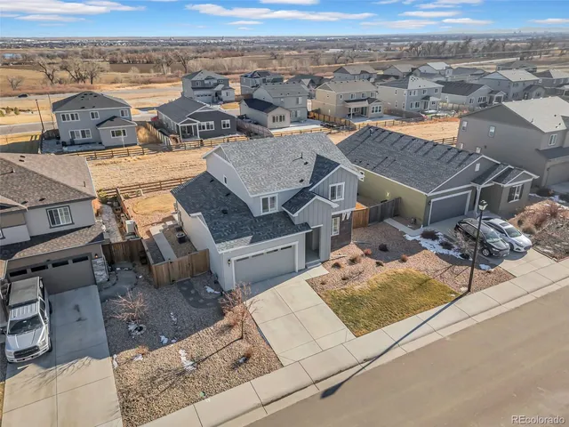 aerial view of a house with a outdoor space
