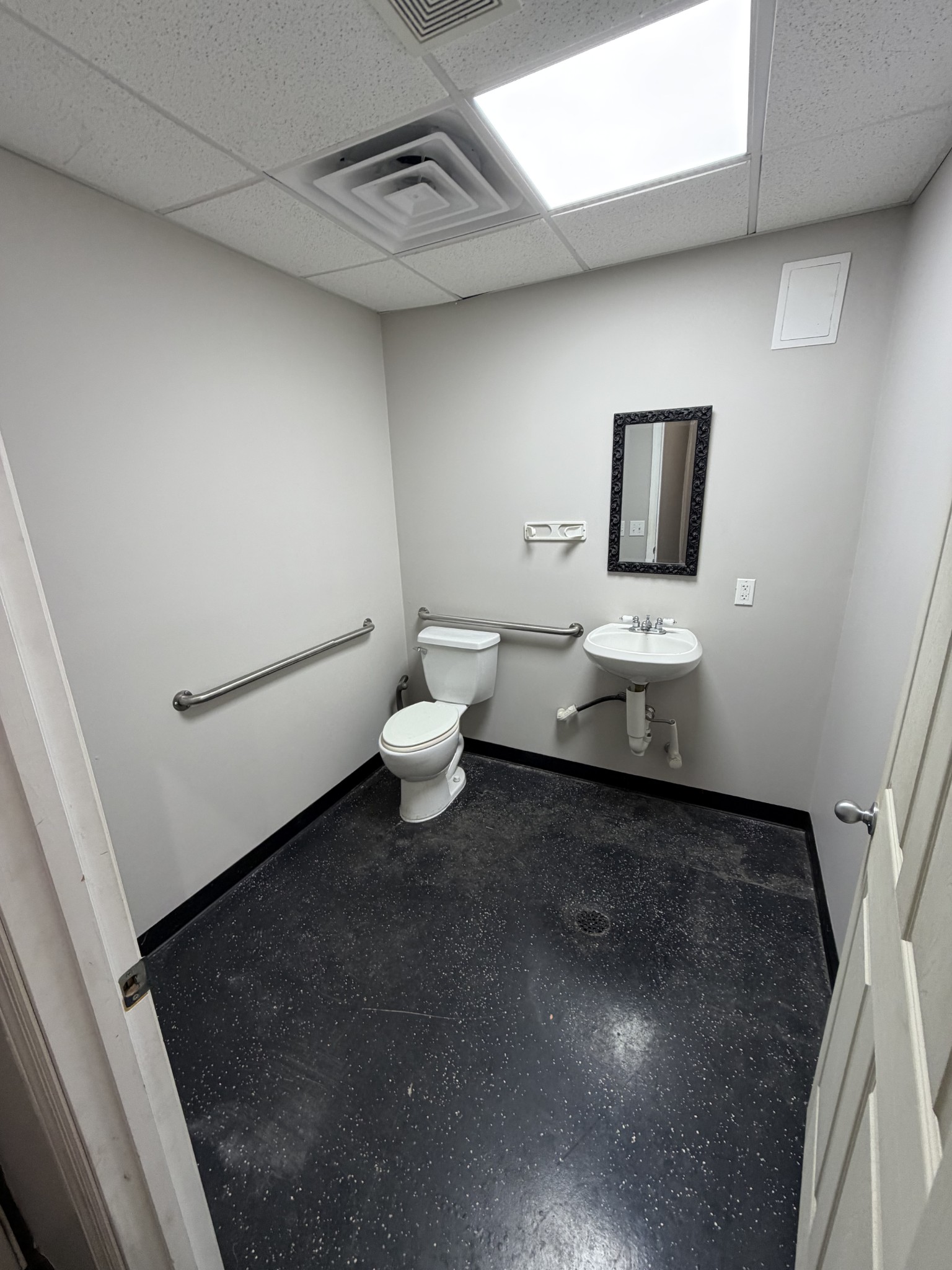 124 Relco Drive Manchester, TN 37355 - Photo 14 of 15 a bathroom with a toilet and a sink
