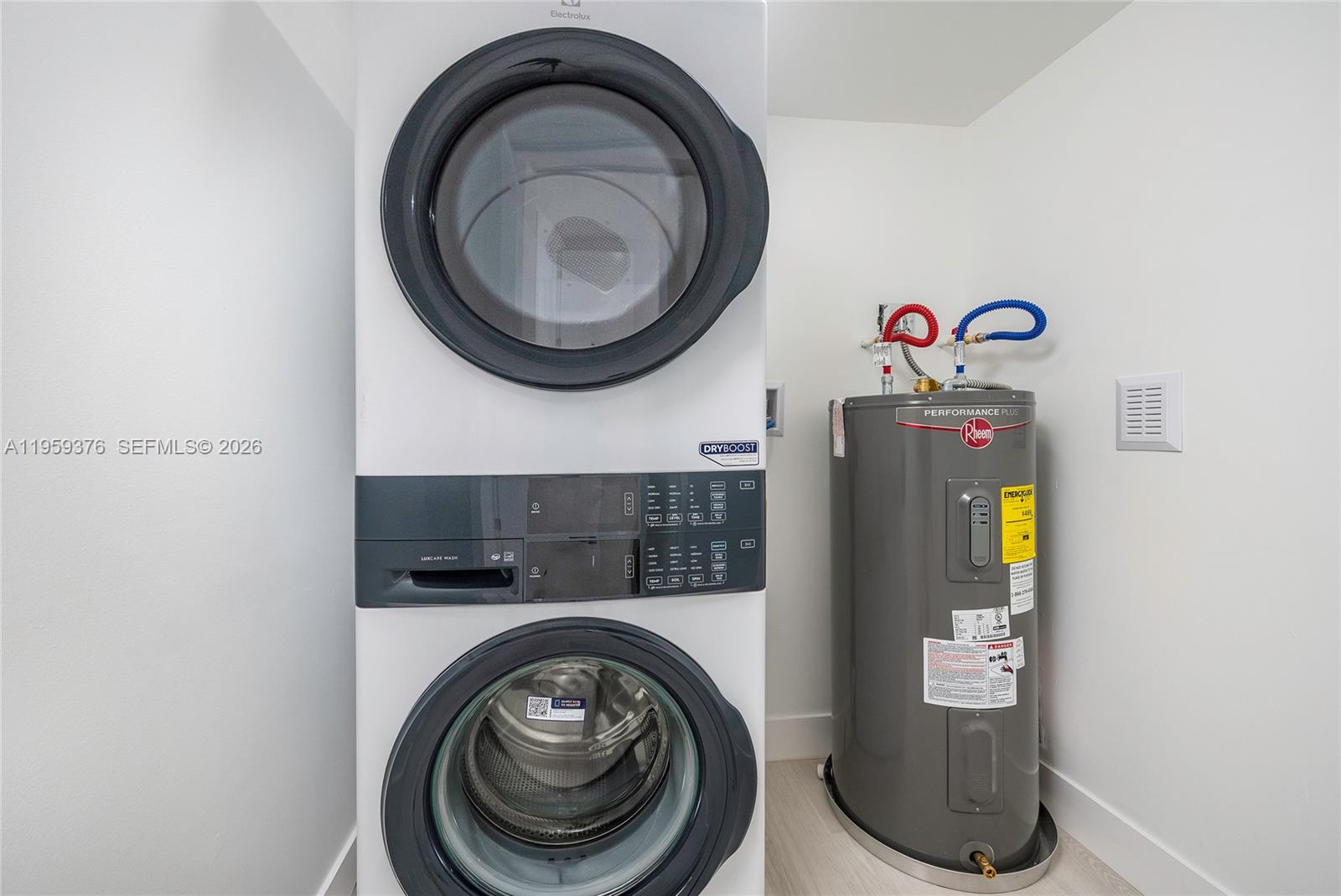 2363 Southwest 11th Terrace Miami, FL 33135 - Photo 37 of 49 a utility room with dryer and washer