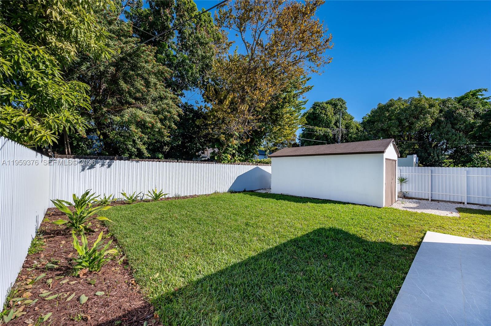2363 Southwest 11th Terrace Miami, FL 33135 - Photo 42 of 49 a view of a backyard with a small cabin