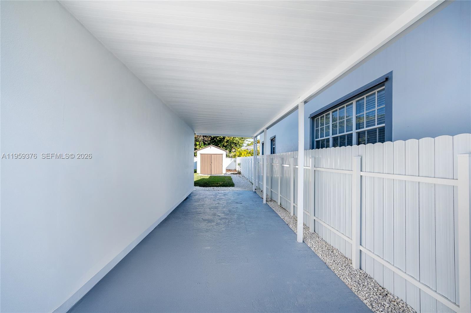 2363 Southwest 11th Terrace Miami, FL 33135 - Photo 45 of 49 a view of a hallway with window