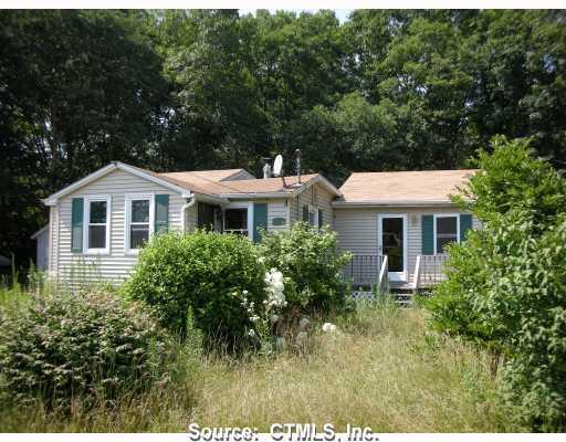 44 Cady Street Killingly, CT 06239 - Photo 1 of 1 a front view of a house with a yard
