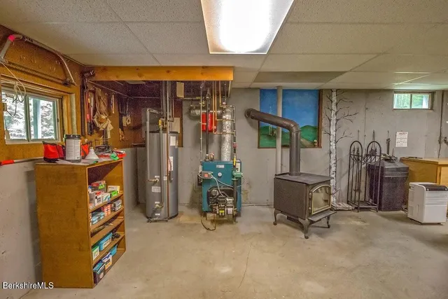 a view of living room with furniture and a window