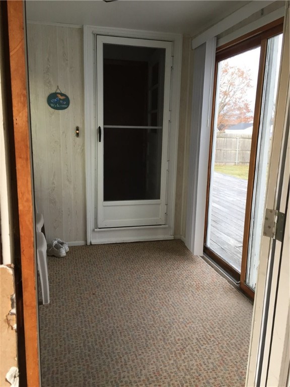 5 Ruth Street Middletown, RI 02842 - Photo 23 of 26 Enclosed Breezeway with sliders to backyard/deck.