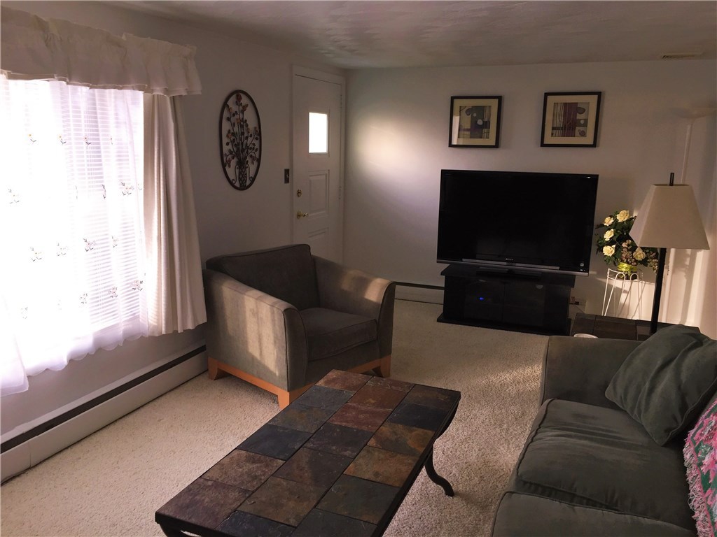 5 Ruth Street Middletown, RI 02842 - Photo 4 of 26 Bright LR w/large picture window.