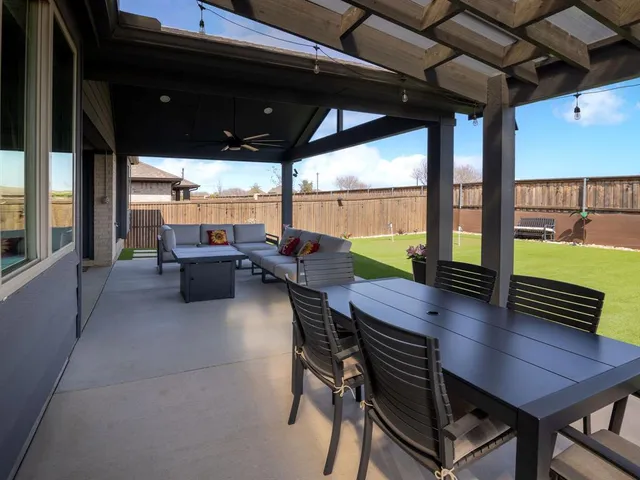 a kitchen with a stove and a fireplace