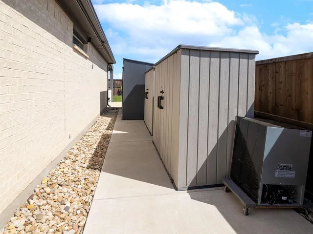 a picture of a bathroom with a shower