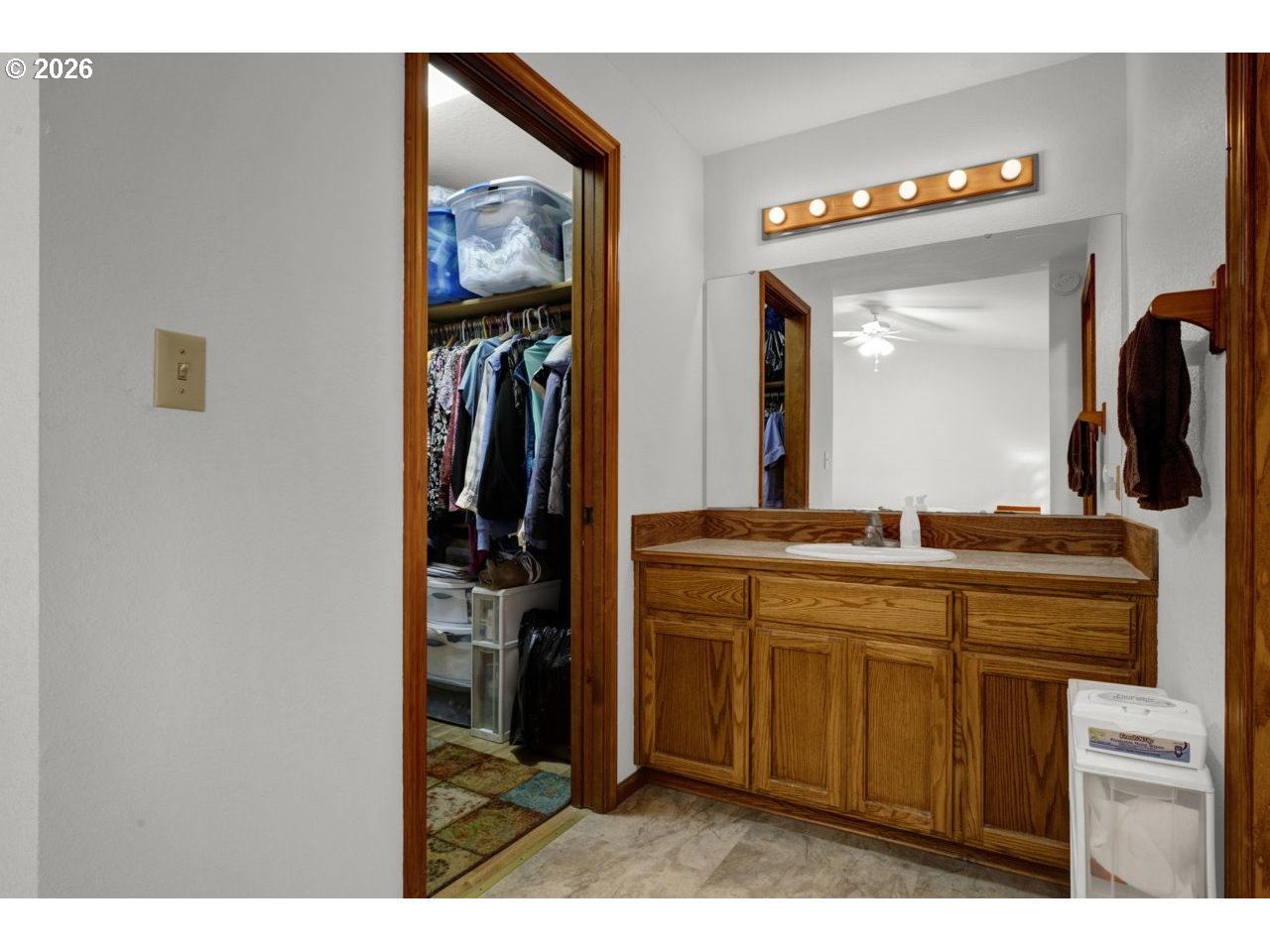 1960 40th Street Florence, OR 97439 - Photo 31 of 48 a bathroom with a sink a vanity and a mirror