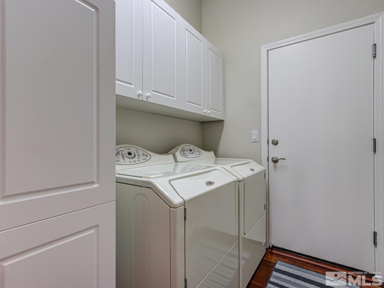 5837 North White Sands Road Reno, NV 89511 - Photo 18 of 22 a utility room with dryer and washer