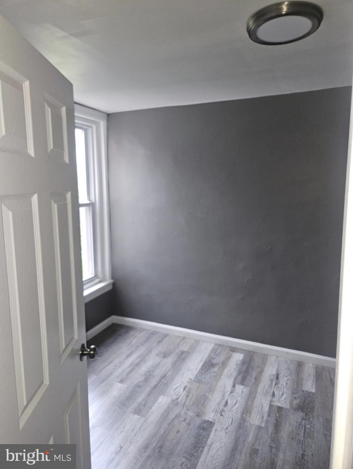 5554 Crowson Street Philadelphia, PA 19144 - Photo 4 of 11 a view of an empty room and window