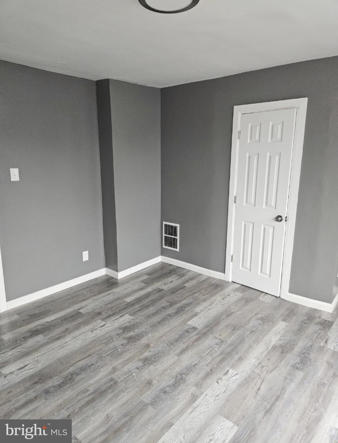 5554 Crowson Street Philadelphia, PA 19144 - Photo 5 of 11 a view of an empty room with a window