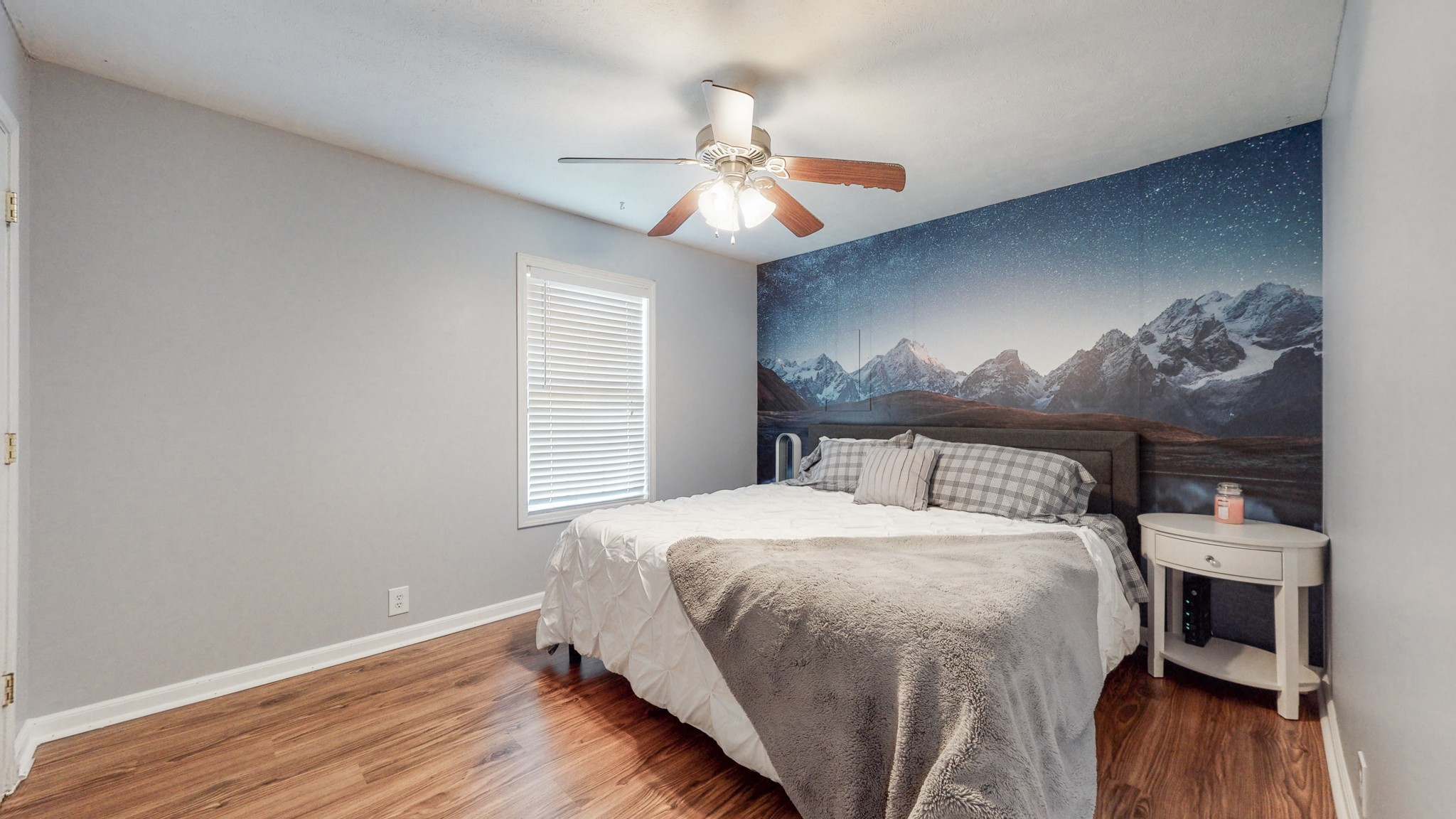 250 Hugh Hunter Road Oak Grove, KY 42262 - Photo 15 of 33 a bedroom with a bed and a chandelier