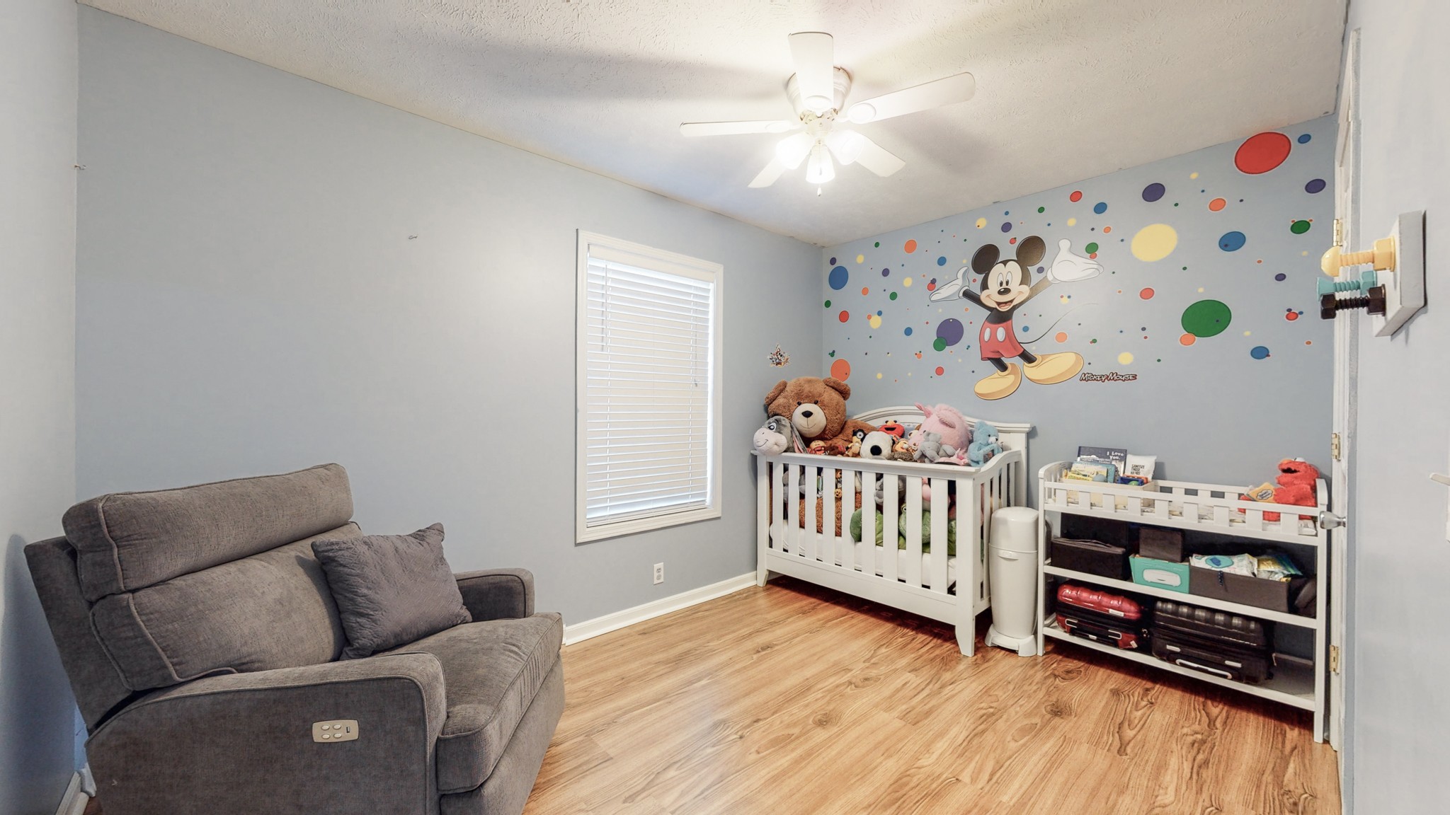 250 Hugh Hunter Road Oak Grove, KY 42262 - Photo 19 of 33 a bedroom with furniture and a wooden floor