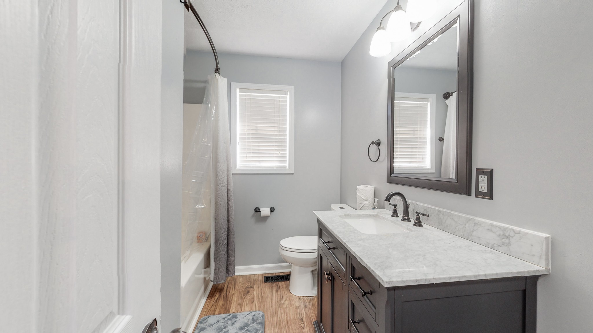 250 Hugh Hunter Road Oak Grove, KY 42262 - Photo 22 of 33 a bathroom with a sink a toilet and a mirror