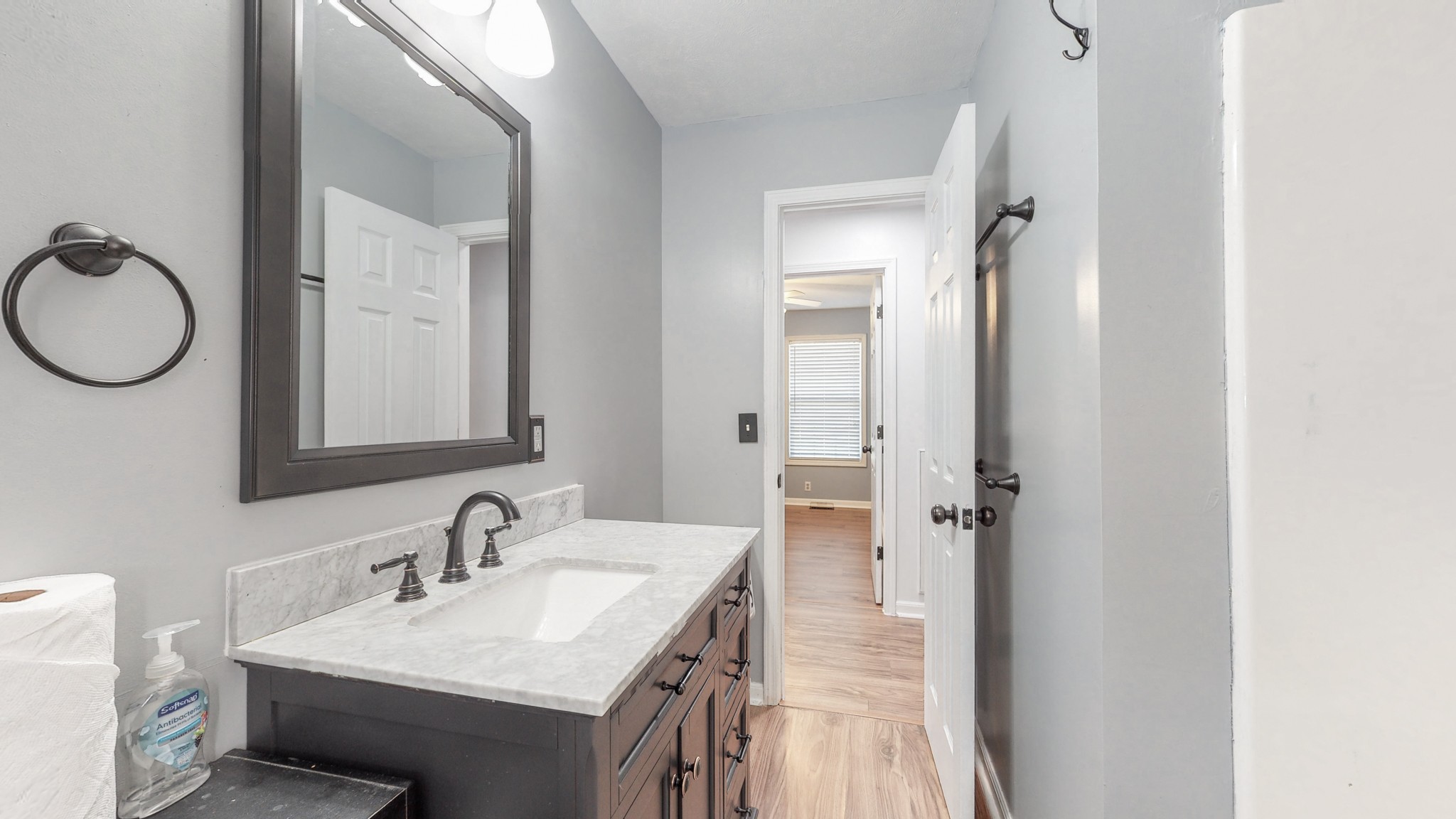 250 Hugh Hunter Road Oak Grove, KY 42262 - Photo 23 of 33 a bathroom with a sink vanity and a mirror