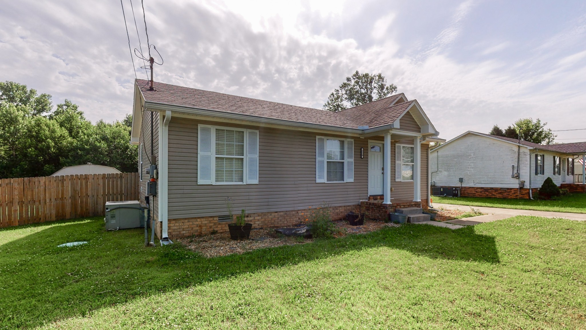 250 Hugh Hunter Road Oak Grove, KY 42262 - Photo 26 of 33 a front view of house with yard and green space