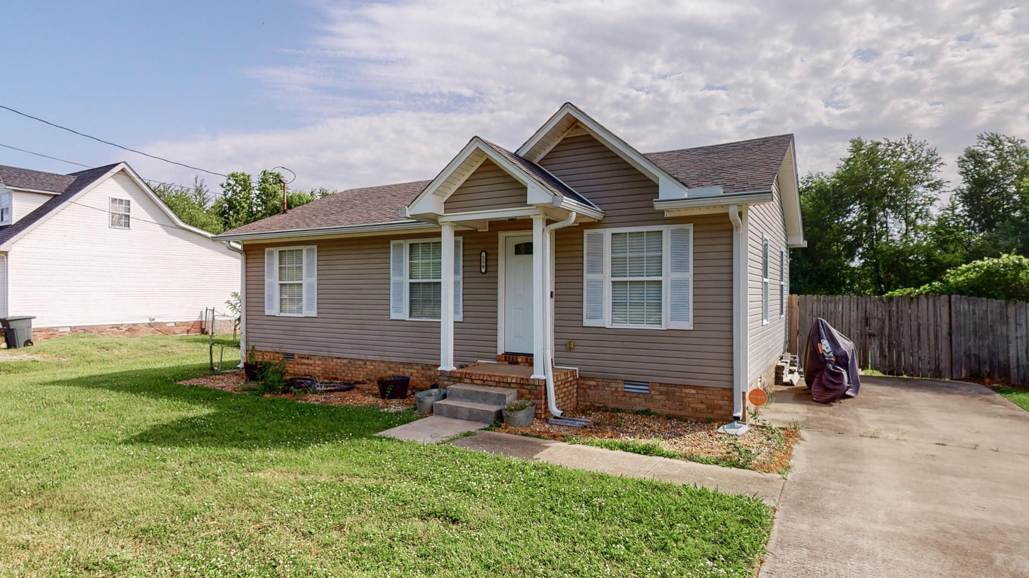 250 Hugh Hunter Road Oak Grove, KY 42262 - Photo 27 of 33 a front view of a house with garden