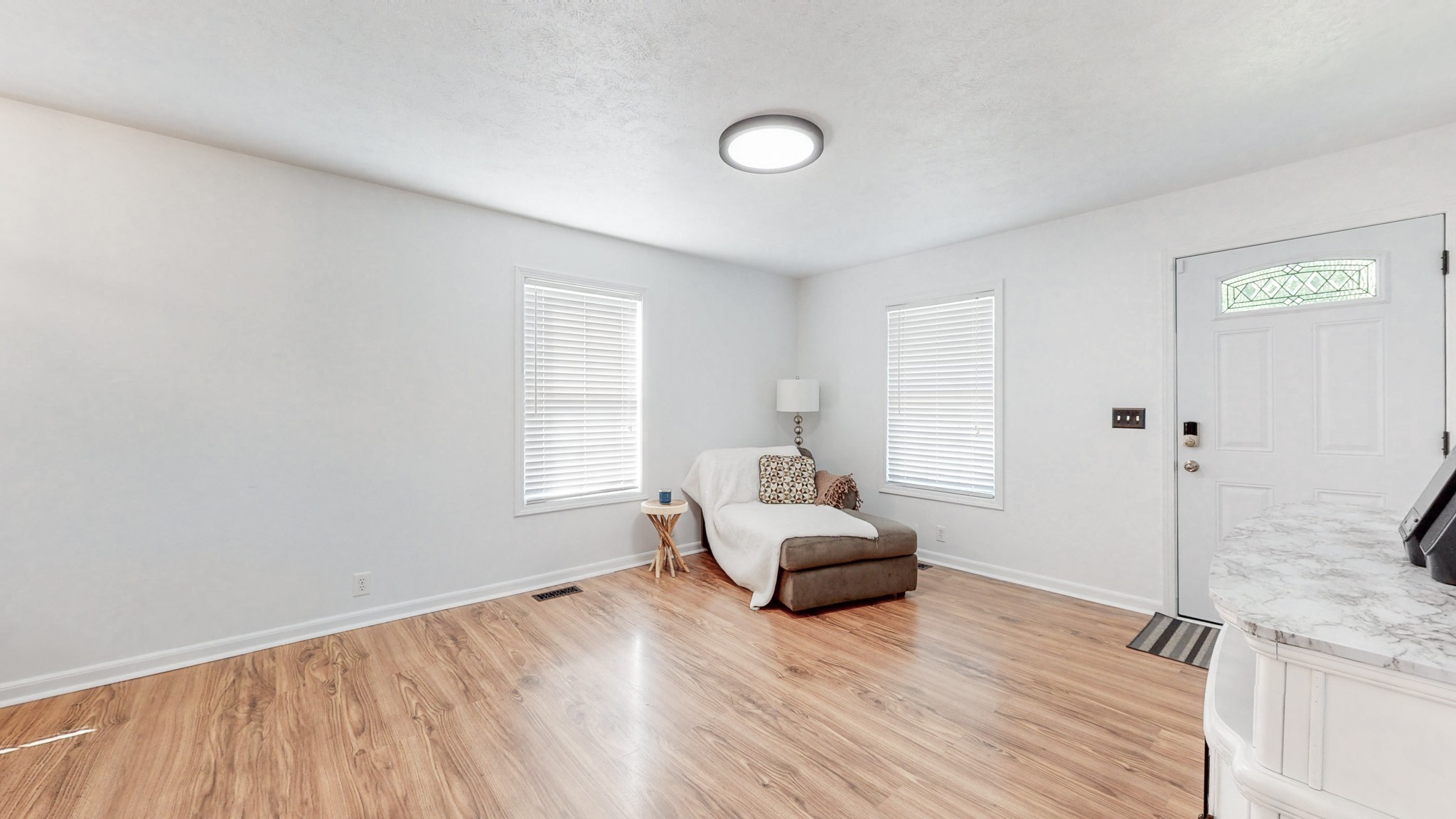 250 Hugh Hunter Road Oak Grove, KY 42262 - Photo 5 of 33 a view of empty room with wooden floor and fan