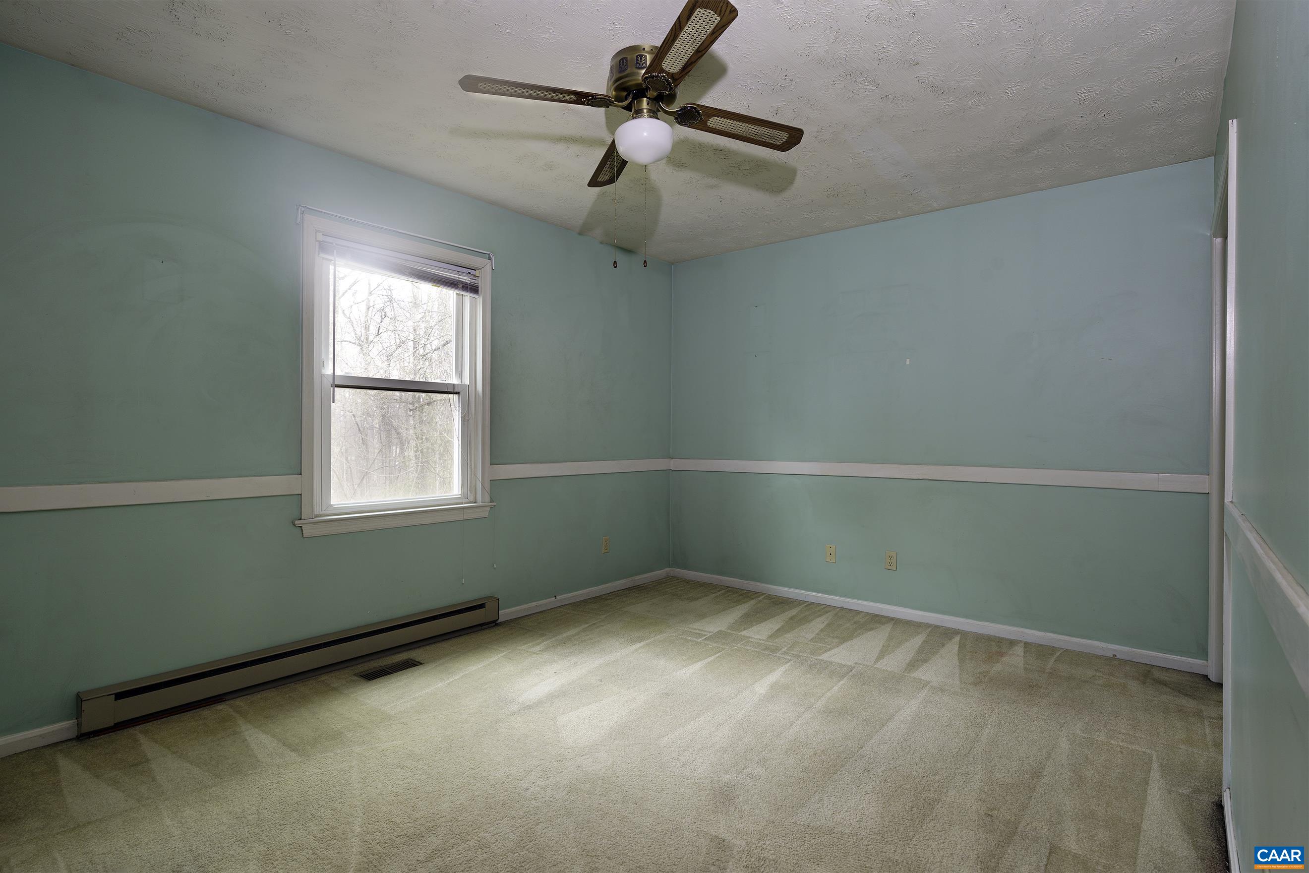 465 Stephens Loop Ruckersville, VA 22968 - Photo 14 of 23 a view of room with window and ceiling fan