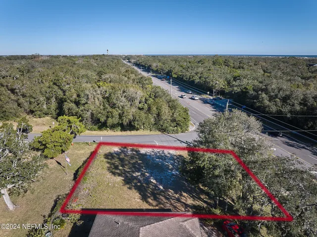 a view of a floor to ceiling window and an ocean