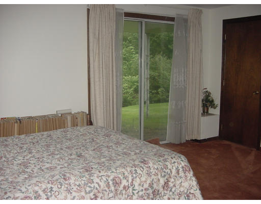 17 Mary Chilton Road Needham, MA 02492 - Photo 6 of 7 a bedroom with a bed and a window