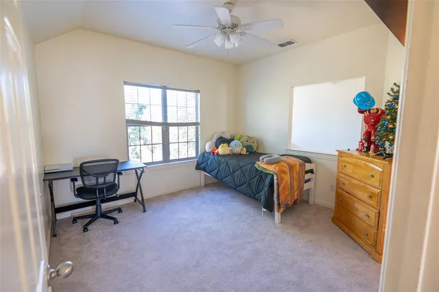 a room with furniture and a window