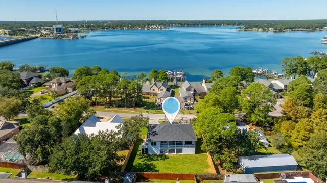 a view of hallway with wooden floor