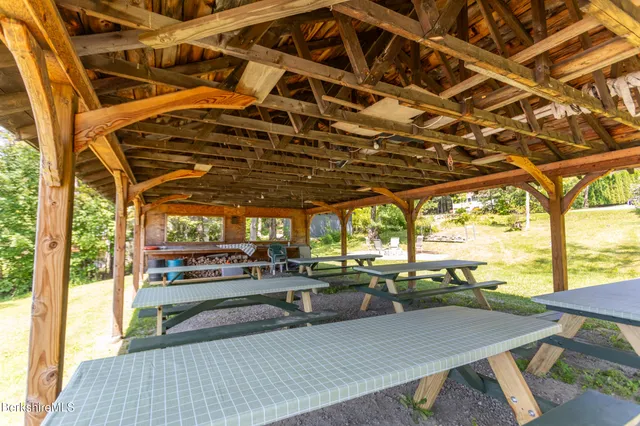 a swimming pool with wooden fence