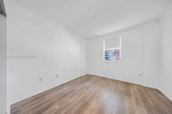 an empty room with a window