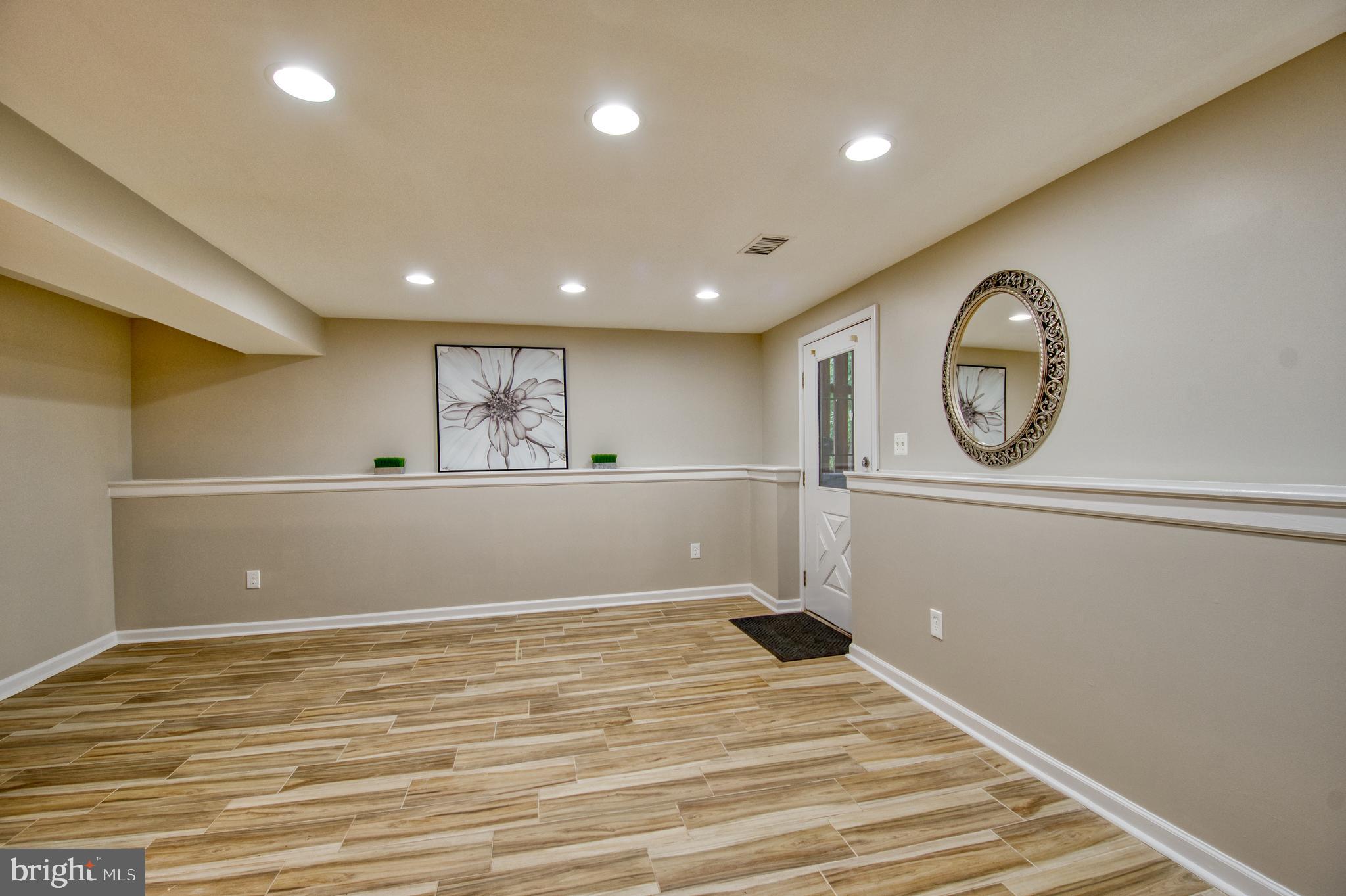45412 Gable Square Sterling, VA 20164 - Photo 27 of 36 LL Rec Room with Tile floors