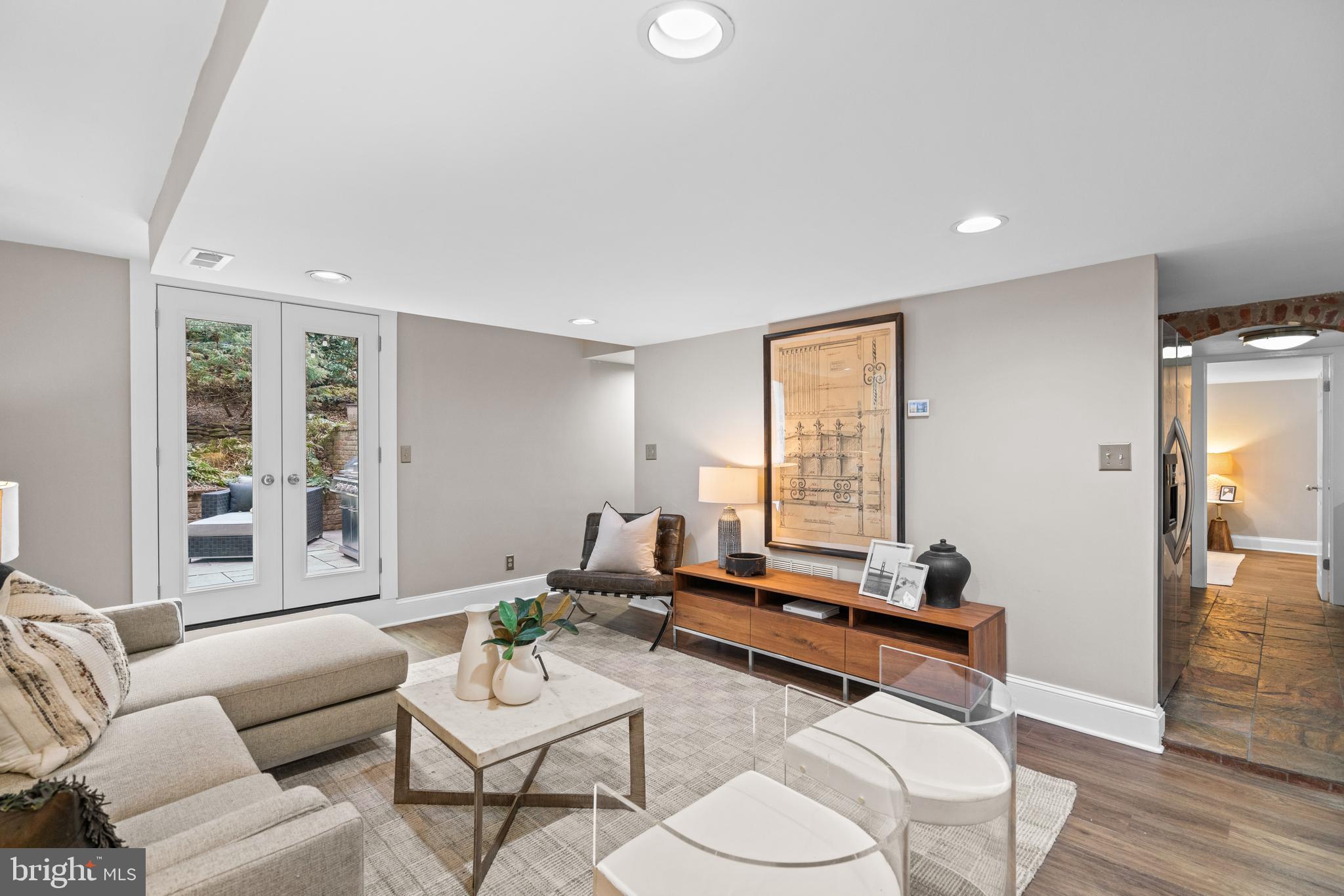 Lovely and spacious living room leads to patio