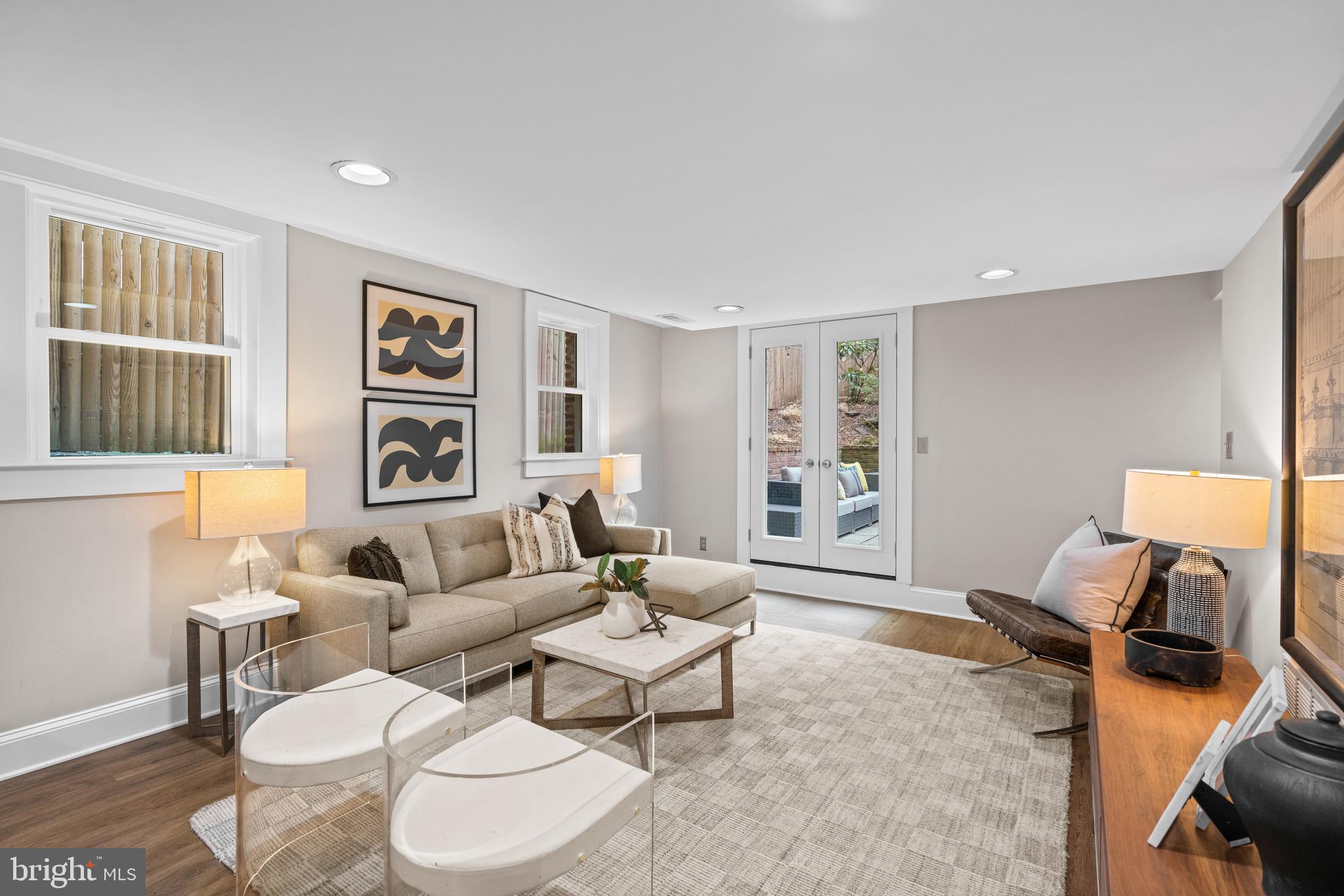 1726 17th Street Northwest, Unit B1 Washington, DC 20009 - Photo 6 of 33 a living room with furniture and a window