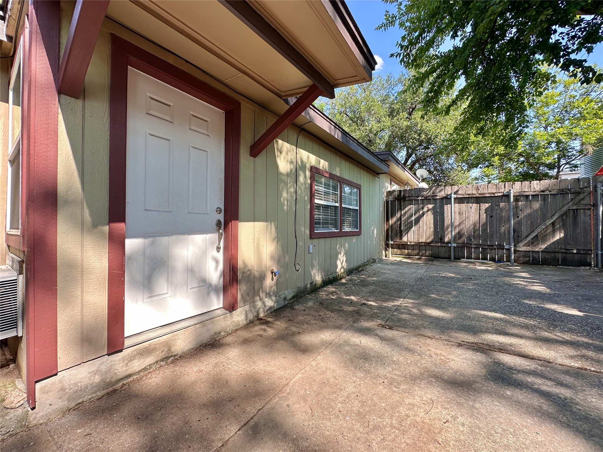 2103 East 16th Street, Unit ANNEX Austin, TX 78702 - Photo 17 of 23 a view of a house with a backyard
