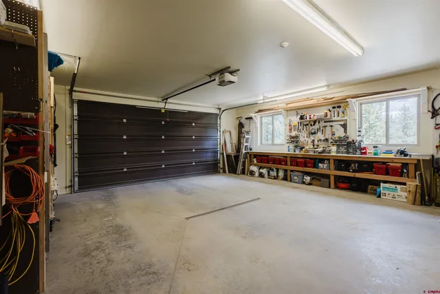 a big room with closet and windows