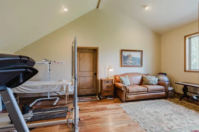 a livingroom with furniture and a rug
