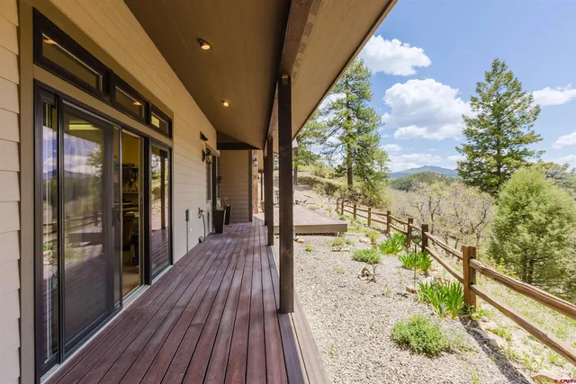 a hallway with wooden floor