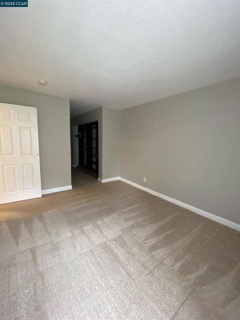 1544 Bailey Road Concord, CA 94521 - Photo 13 of 18 an empty room with a natural light