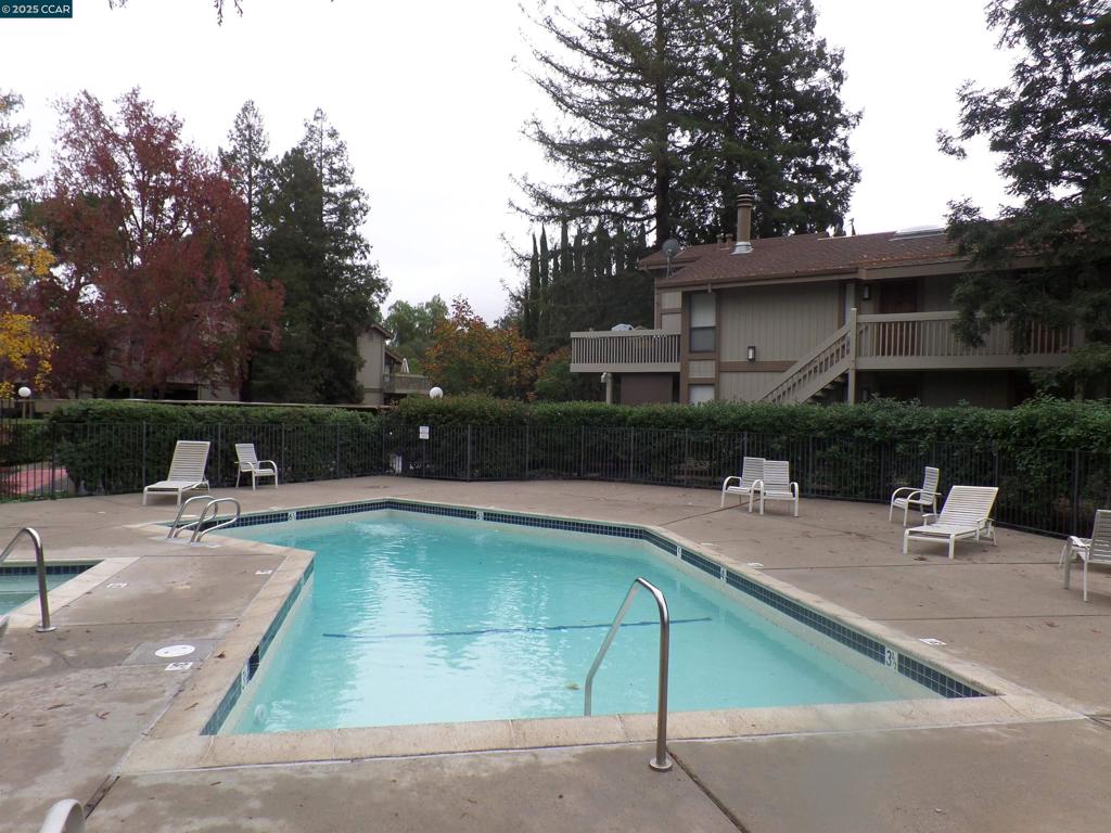 1544 Bailey Road Concord, CA 94521 - Photo 18 of 18 a view of a swimming pool with chairs