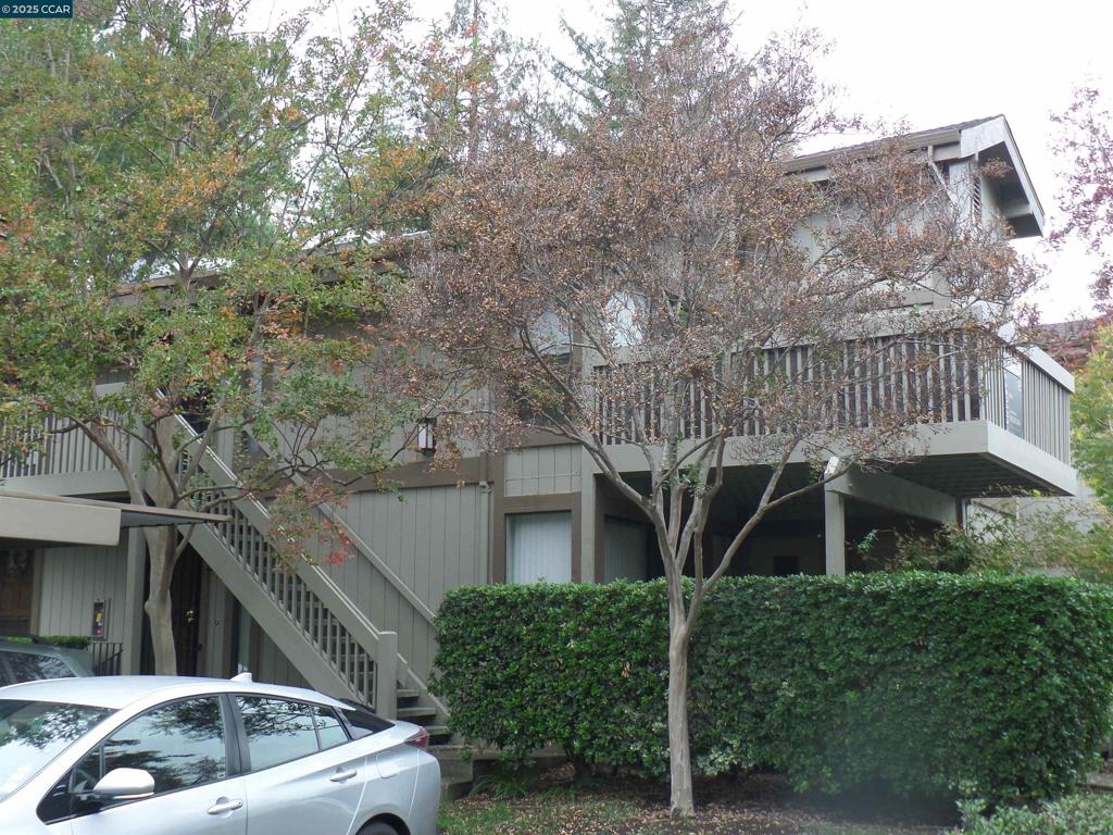 1544 Bailey Road Concord, CA 94521 - Photo 2 of 18 a front view of a house with garden