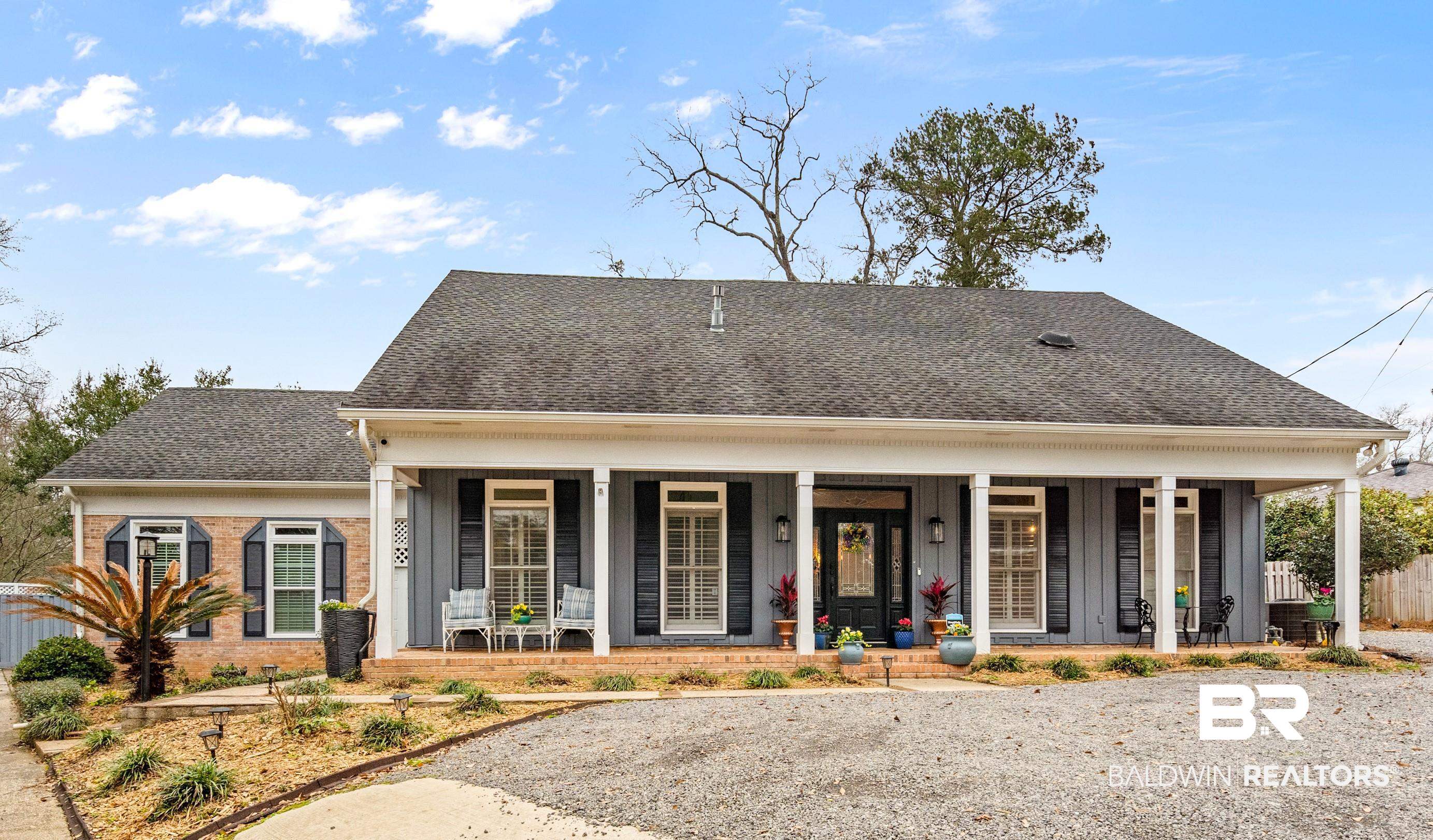 2828 Grant Street, Unit C Mobile, AL 36606 - Photo 1 of 37 View of front of property featuring a porch