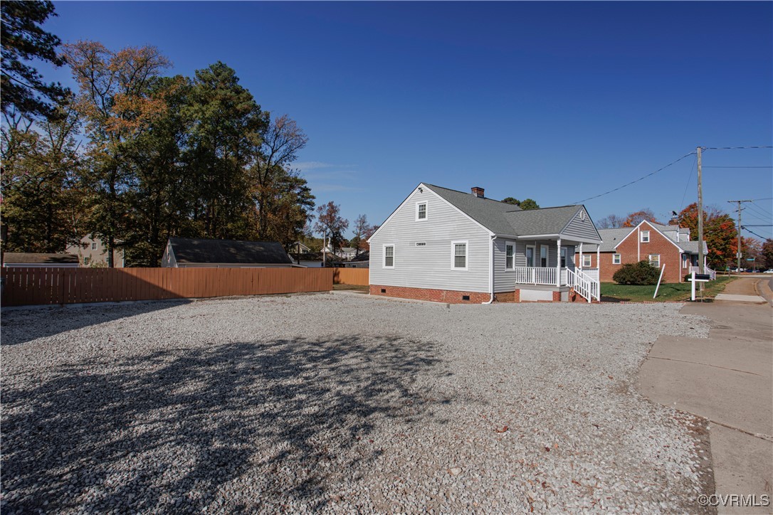 6116 Staples Mill Road Henrico, VA 23228 - Photo 5 of 24 Rear view of property featuring covered porch
